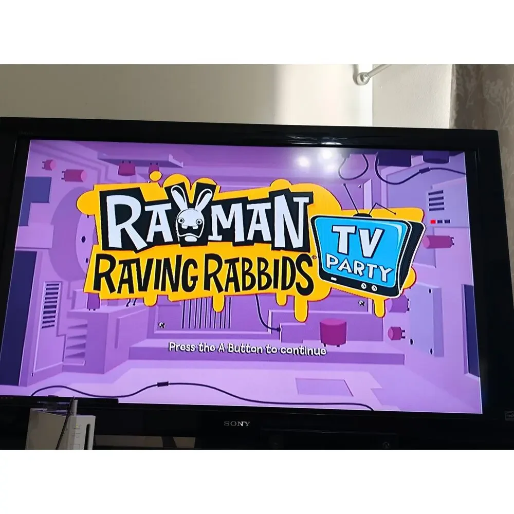 Rayman Raving Rabbids TV Party Nintendo Wii CIB Manual